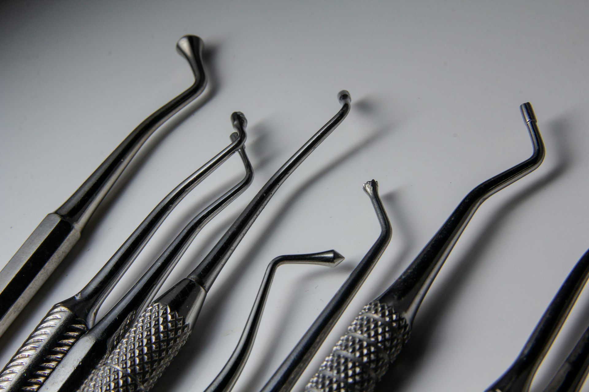 a group of dental tools sitting on top of a table